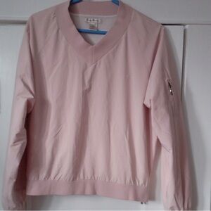 Pink windbreaker style crewneck sweatshirt by Tommy Bahama